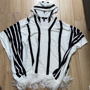 Hooded poncho with fringe detail